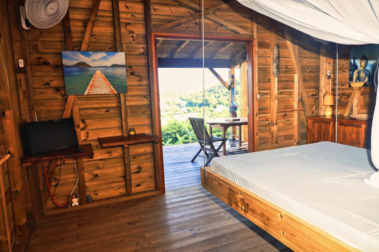Ti Kaz Anoli Cottage En Bois Avec Vue Sur La Baie Terre-de-Bas Esterno foto